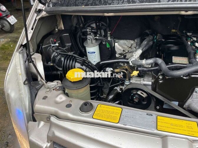 Ford Transit 16 chỗ Vàng cát 2011