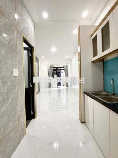 nhà mới sổ hoàn công đối diện trường đh nguyễn tất thành P.apđ Q12
