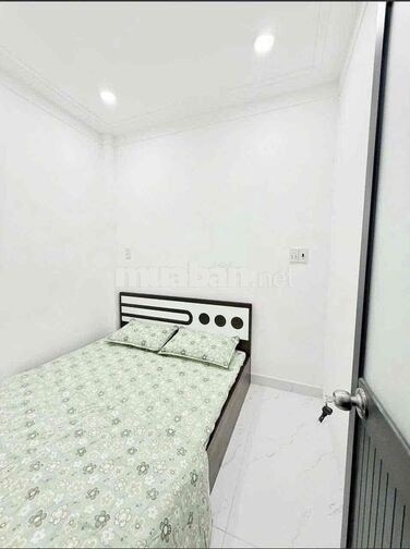 nhà mới sổ hoàn công đối diện trường đh nguyễn tất thành P.apđ Q12