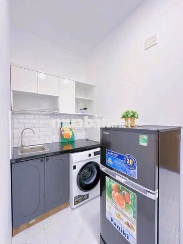 Căn hộ trung tâm máy giặt riêng 35m2 tách bếp, gần chợ Tân Định, ISB