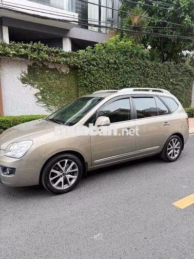 Kia Caren S 2.0 2014 Vàng Cát