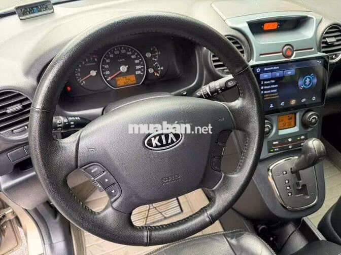 Kia Caren S 2.0 2014 Vàng Cát