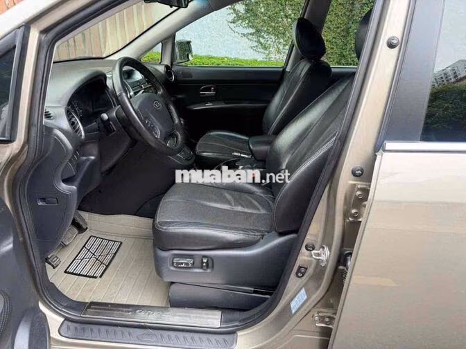 Kia Caren S 2.0 2014 Vàng Cát