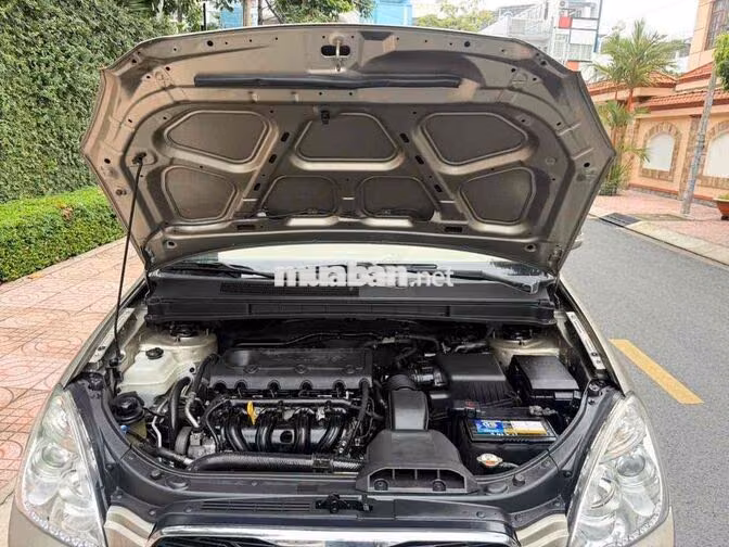 Kia Caren S 2.0 2014 Vàng Cát