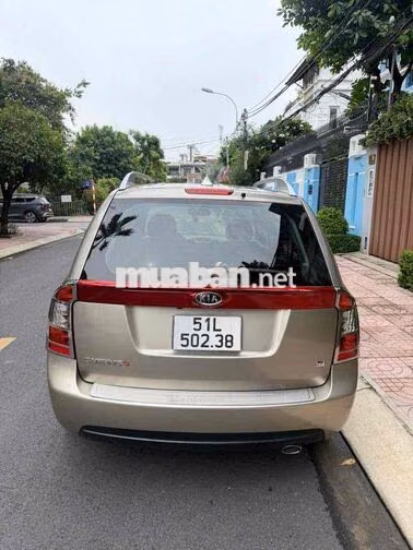 Kia Caren S 2.0 2014 Vàng Cát