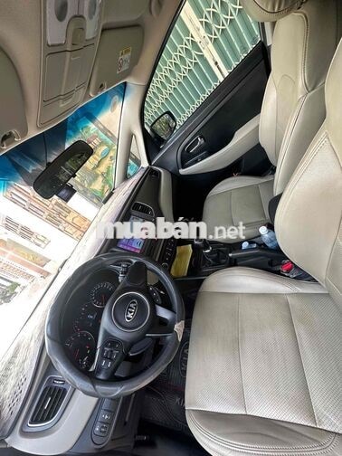 Kia Rondo 7 chỗ MT Vàng cát 7.2v km