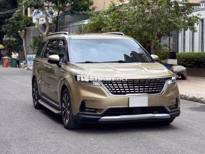 Kia Carnival Signature 2022 Vàng 7 chỗ