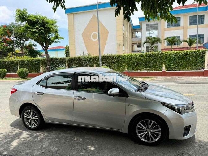 Toyota Corolla Altis 1.8G 2015 Bạc 140.000km