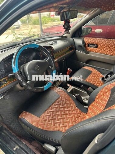Toyota Camry GLI màu xanh, phiên bản GLI.