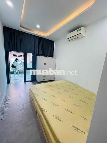 Cho thuê phòng ban công 20m2 hẻm xe hơi Lê Văn Sỹ q3
