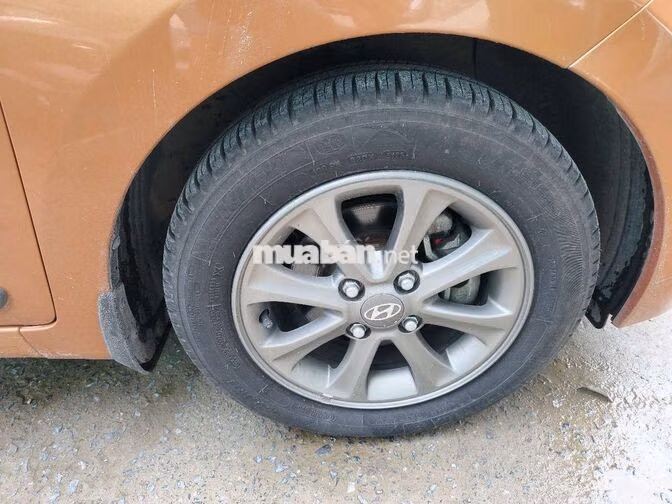 Hyundai Grand i10 1.0AT 2014 Vàng đồng