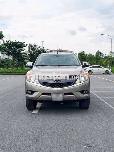 Mazda BT50 1 Cầu 2015 Vàng cát 164951 km