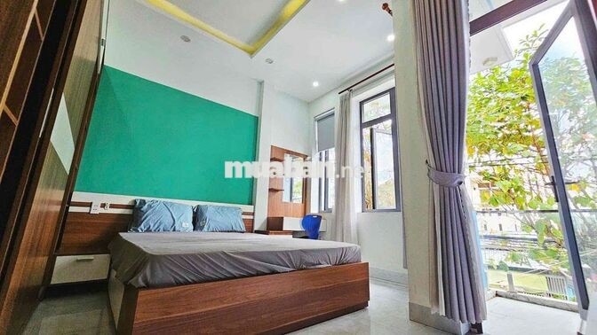 245  CHO THUÊ NHÀ 4 TẦNG MẶT TIỀN NGUYỄN NHÀN