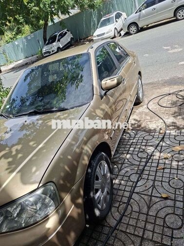 Ford Laser 1.8 Số sàn Vàng cát