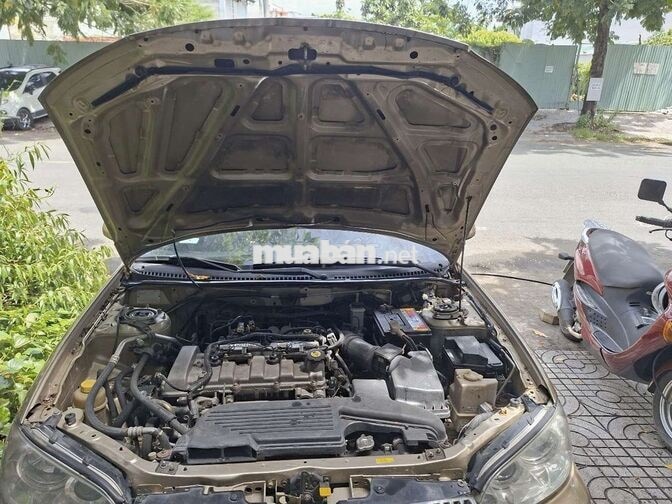 Ford Laser 1.8 Số sàn Vàng cát