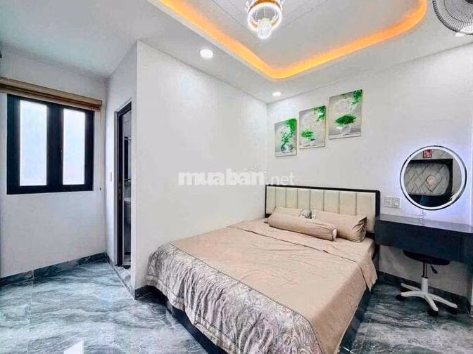 cho thuê nhà Nguyễn Tư giãn p12(4x13) lửng , 3 lầu , 5pn , 6wc full