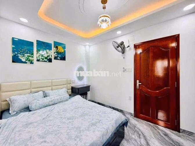 cho thuê nhà Nguyễn Tư giãn p12(4x13) lửng , 3 lầu , 5pn , 6wc full
