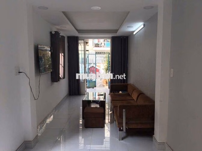 cho thuê nhà căn góc 2,8x14 tr 2 lầu 3pn 3vs Võ Văn Kiệt Q1