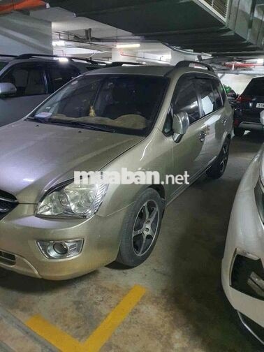 KIA Caren 2010 Vàng cát