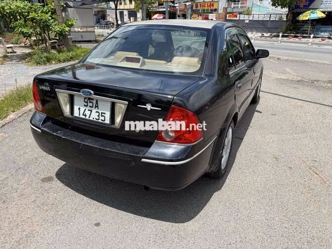Ford Laser 2004 Đen 5 chỗ