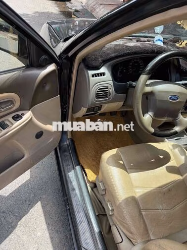 Ford Laser 2004 Đen 5 chỗ