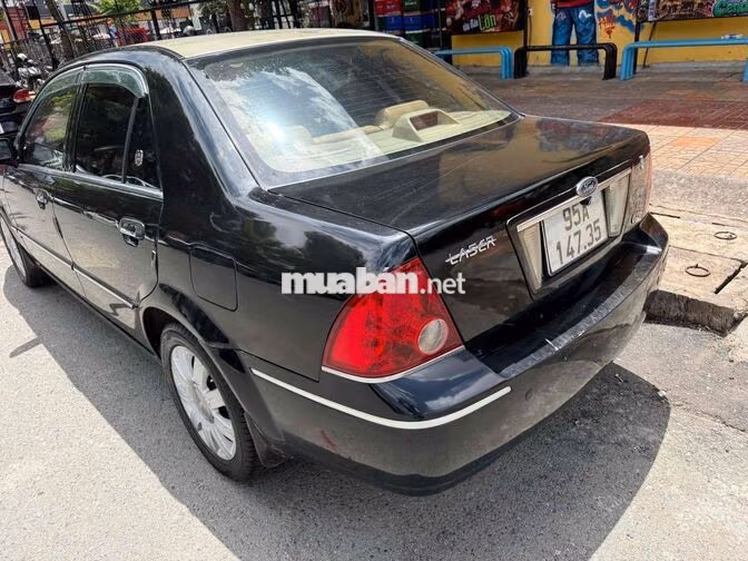 Ford Laser 2004 Đen 5 chỗ