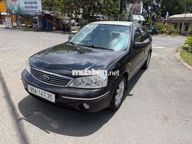 Ford Laser 2004 Đen 5 chỗ