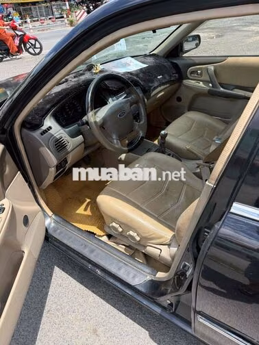 Ford Laser 2004 Đen 5 chỗ
