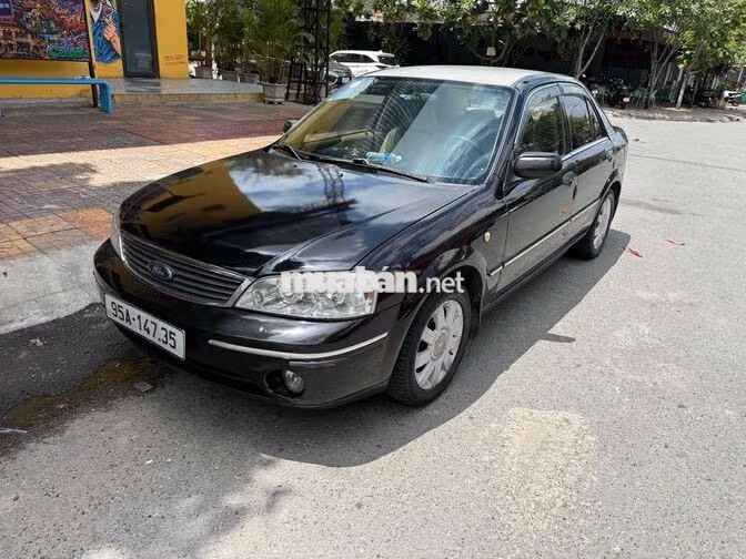 Ford Laser 2004 Đen 5 chỗ