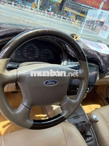 Ford Laser 2004 Đen 5 chỗ