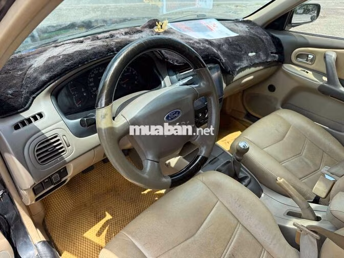 Ford Laser 2004 Đen 5 chỗ