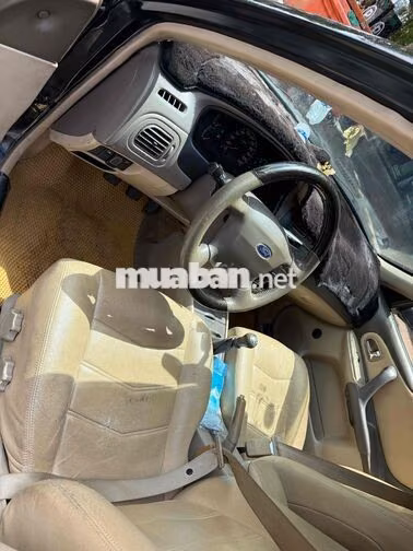 Ford Laser 2004 Đen 5 chỗ