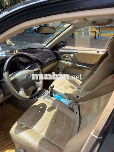 Ford Laser 2004 Đen 5 chỗ