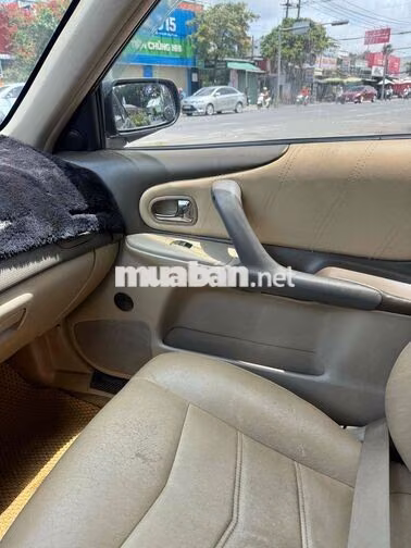 Ford Laser 2004 Đen 5 chỗ