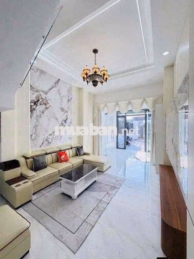 NHÀ RỘNG. SÂN XE HƠI. TRỆT 2 LẦU 4PN 5WC. ĐƯỜNG THÔNG