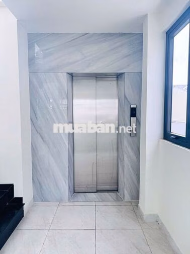 TÒA NHÀ MT LÊ VĂN DUYỆT Q. BÌNH THẠNH , DTSD : 700M2 NGANG 8M , 100TR