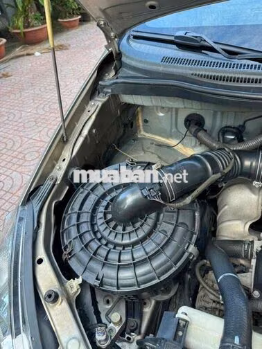 Toyota Innova G 2012 màu vàng cát