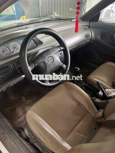 Mazda 4-5 chỗ màu Trắng