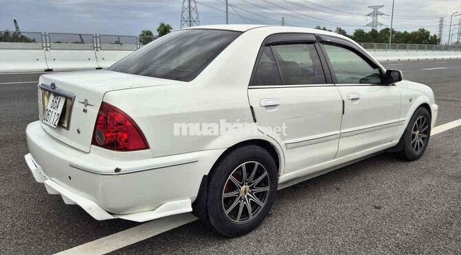 Ford Laser 1.8 MT Trắng Số sàn