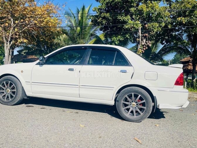 Ford Laser 1.8 MT Trắng Số sàn
