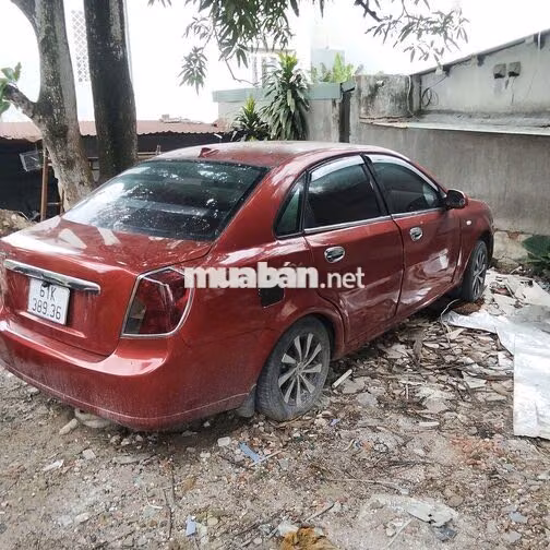 Lacetti 2004 đỏ xe gia đình không chạy cần bán.