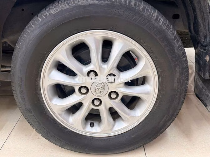 Toyota Innova E 2014 Số sàn Bạc 100.000 km