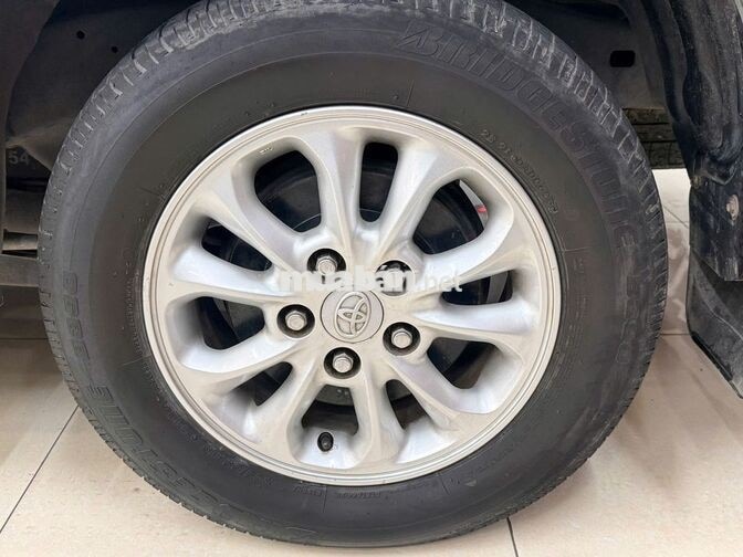 Toyota Innova E 2014 Bạc 100.458 km