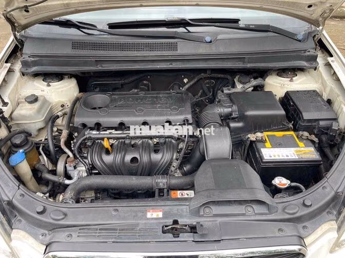 Kia Carens 2013 Trắng 7 chỗ Số sàn