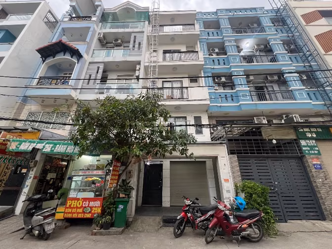 Căn hộ dịch vụ 5 tầng ngay Đại học Văn Lang - thu nhập 50tr/tháng - Hẻ