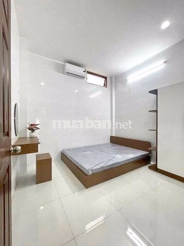 28 phổ Quang F2 Tân bình. 2 mtiền nền hay đi cửa sau Sau lưng NH Hoa