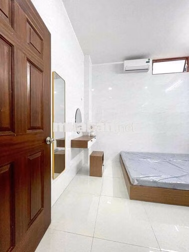 28 phổ Quang F2 Tân bình. 2 mtiền nền hay đi cửa sau Sau lưng NH Hoa