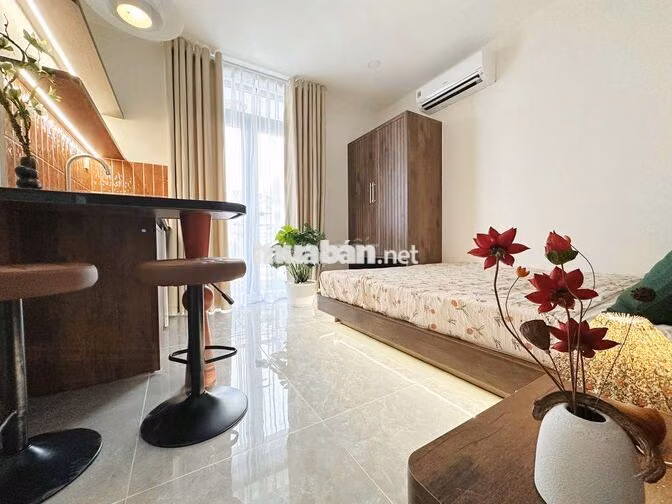 Căn hộ thang máy hầm xe ban công full nội thất ngay Nơ Trang Long BTH