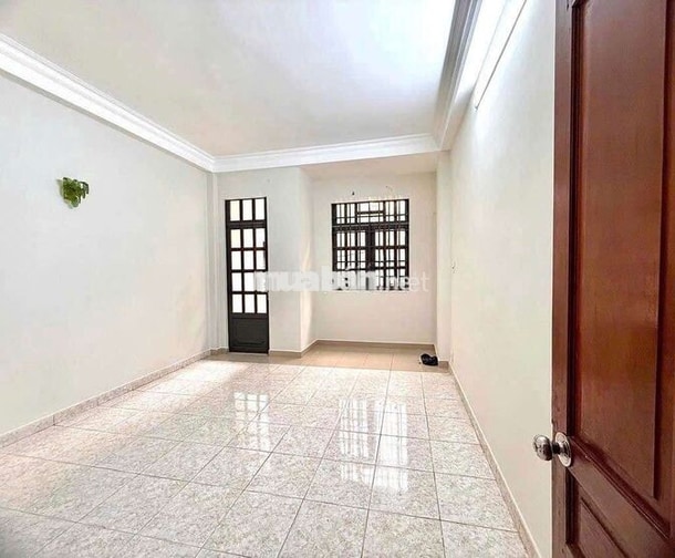 Nhà 1 Trệt 2 Lầu Sân Thượng 4PN Mặt Tiền Đường Số Phường Tân Phong