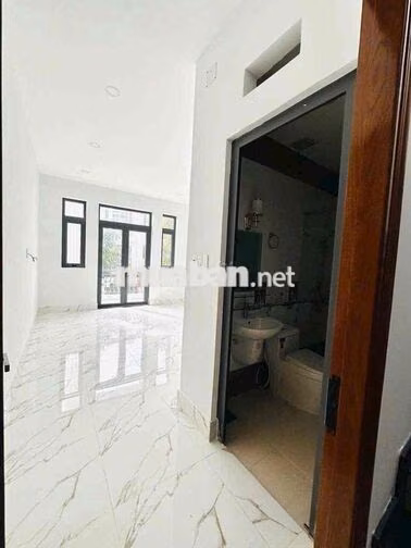 nhà 1 trệt 2 lầu Cách ngã 6 An Phú, Thuận An 1,5 km, đường 7m